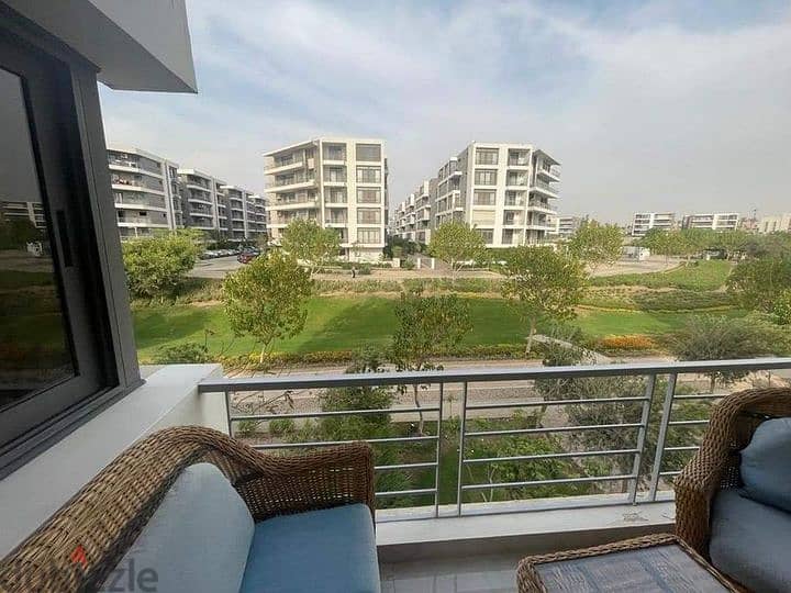 With the old price | Apartment with garden with 5% down payment in Taj City, in front of the airport, with a distinctive view. 6