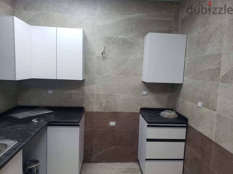 Apartment  with Kitchen and Acs for rent Sky Condos Sodic New Cairo 2