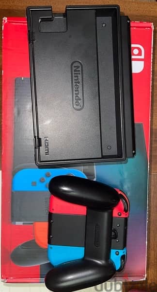Nintendo switch with accessories 1