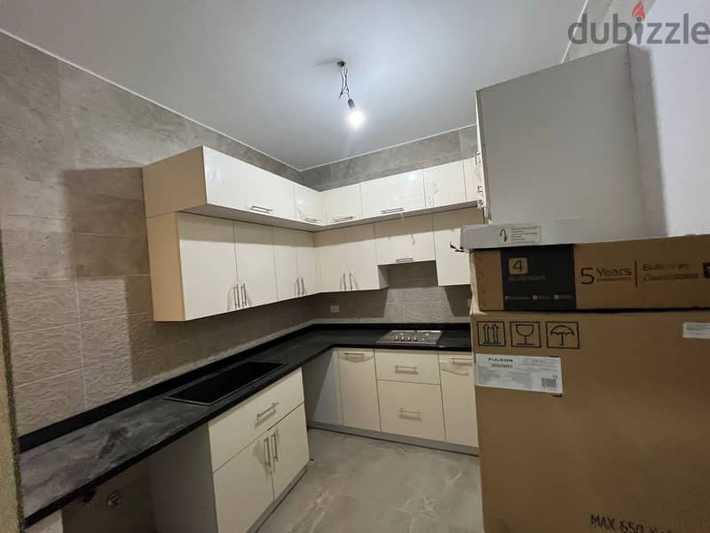 A FULLY FINISHED APARTMENT WITH ACS READY TO MOVE PRIME LOCATION WITH DP & INSTALLMENTS 2