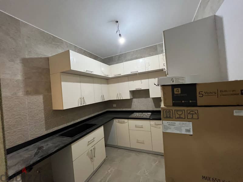 APARTMENT WITH ROOF FULLY FINISHED READY TO MOVE FOR SALE- AL-MARASEM FIFTH SQUARE 4