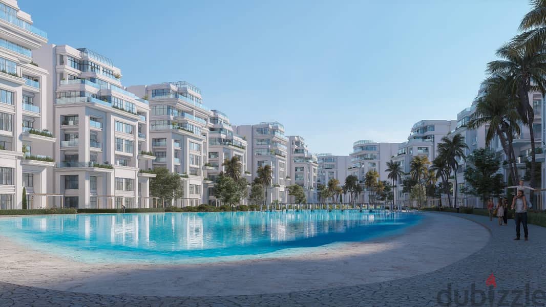 Ground floor apartment in a garden directly in front of the lagoon, with installments over 8 years, in a compound in the New Administrative Capital, R 0