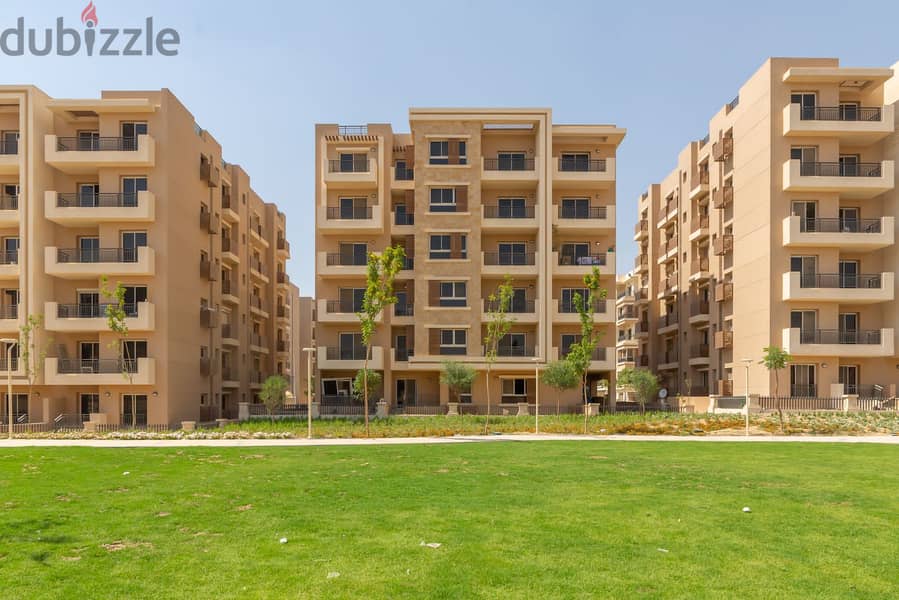 In front of the Kempinski Hotel, 129 sqm apartment for sale in Taj City, First Settlement 6