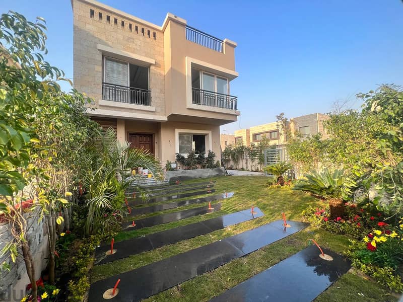 With a 110% discount on the down payment, ground and first villa of 143m corner for sale in front of Cairo Airport, in Taj City Compound, New Cairo. 1