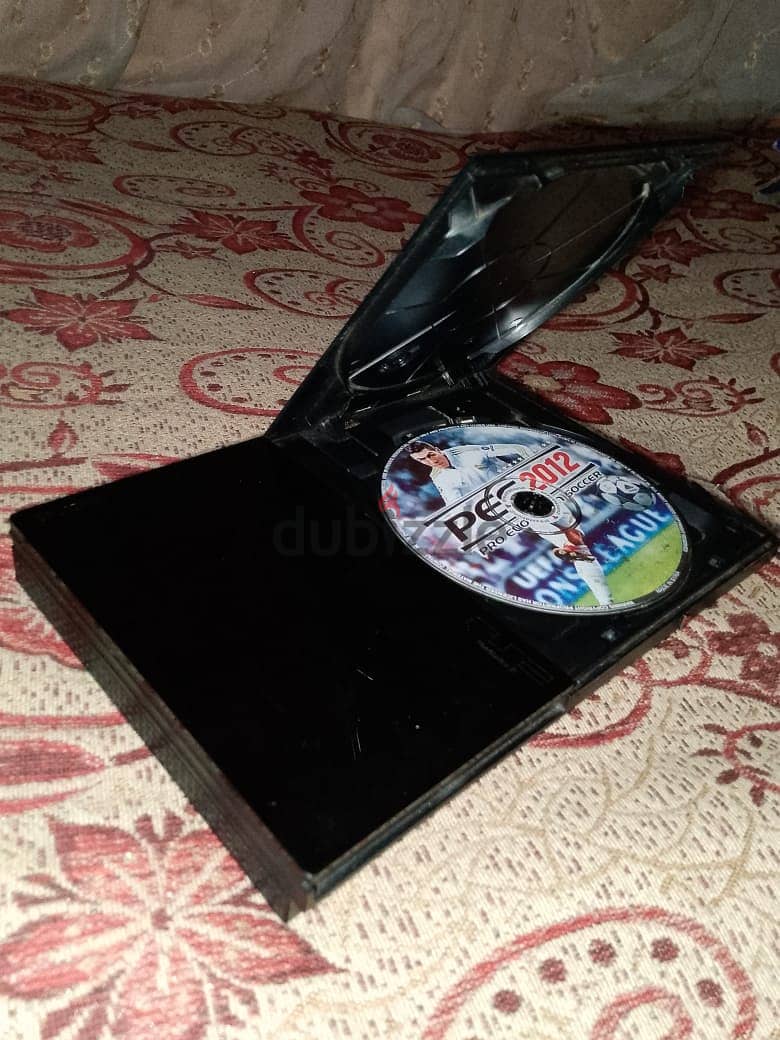 Playstation 2 مع اسطوانات افلام كرتون تباع منفصله 8