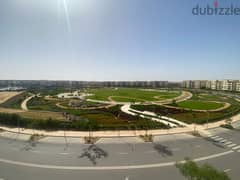 Apartment for rent in Crescent in Mivida Compound - Emaar, next to the American University