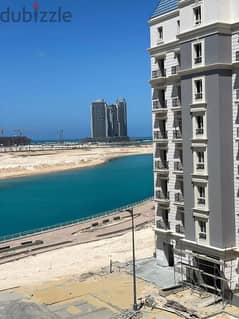Ready to move in ((with a DP= of 750 k)) finished nautical apartment next to City Edge Towers in New Alamein in the Latin district, North coast