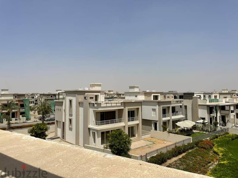 for sale twin house ready to move on landscape and lake  Cairo Festival City 2