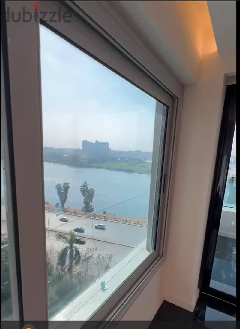 Service Apartment for sale on the Nile Corniche in Cairo, in front of Dahab Island Beside Al Salam International Hospital SMART TOWER 1