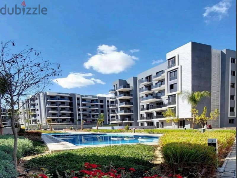 With only 10% down payment, an apartment with a garden, Ready To Move , in Sun Capital Compound, the heart of October A special view of the pyramids 8