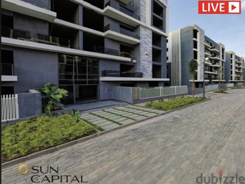 With only 10% down payment, an apartment with a garden, Ready To Move , in Sun Capital Compound, the heart of October A special view of the pyramids 14