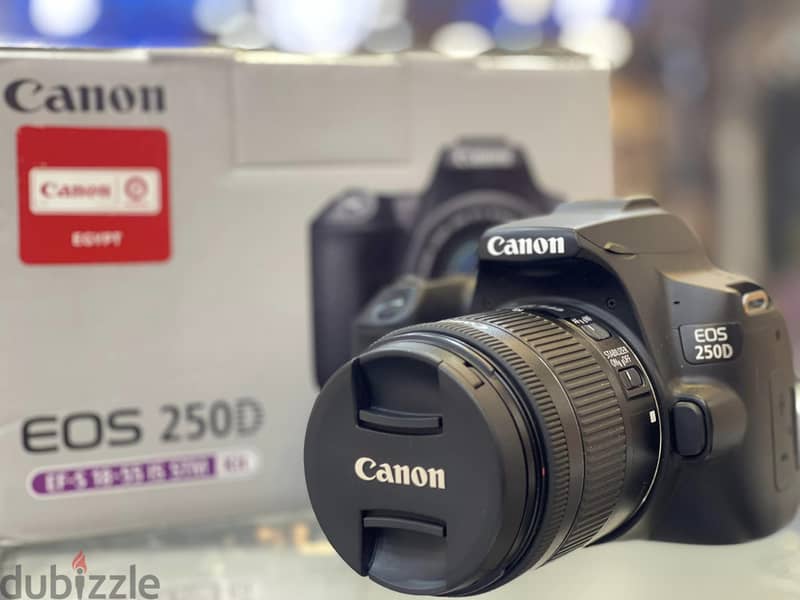 Canon EOS 250D   مفهاش خربوش وبتلمع حرفيا استعمال شخصي 1