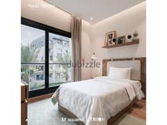 Apartment with garden for sale with 10% down payment and 9 years installment, Trio Garden in the heart of Fifth Settlement, finished, in Trio Garden