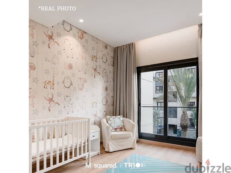 Apartment with garden for sale in Trio Garden, with a 10% down payment, luxurious finishing, installments for 8 years, in the heart of the Fifth Settl 7