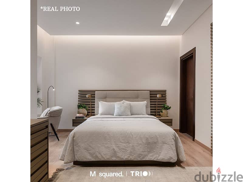 Apartment with garden for sale in Trio Garden, with a 10% down payment, luxurious finishing, installments for 8 years, in the heart of the Fifth Settl 8