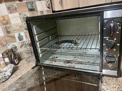 52 Liters فرن كهربائي  Electric Oven  2000 Watts brand Morphy Rechards