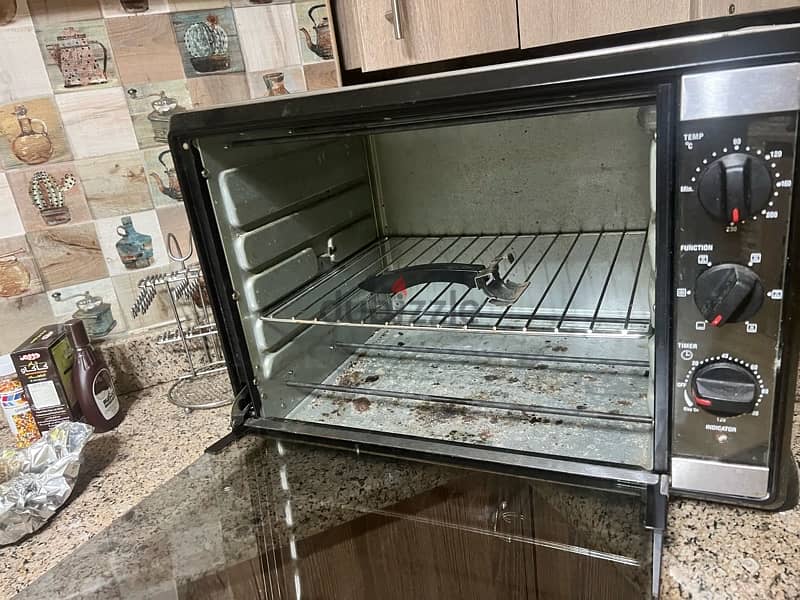 52 Liters فرن كهربائي  Electric Oven  2000 Watts brand Morphy Rechards 0