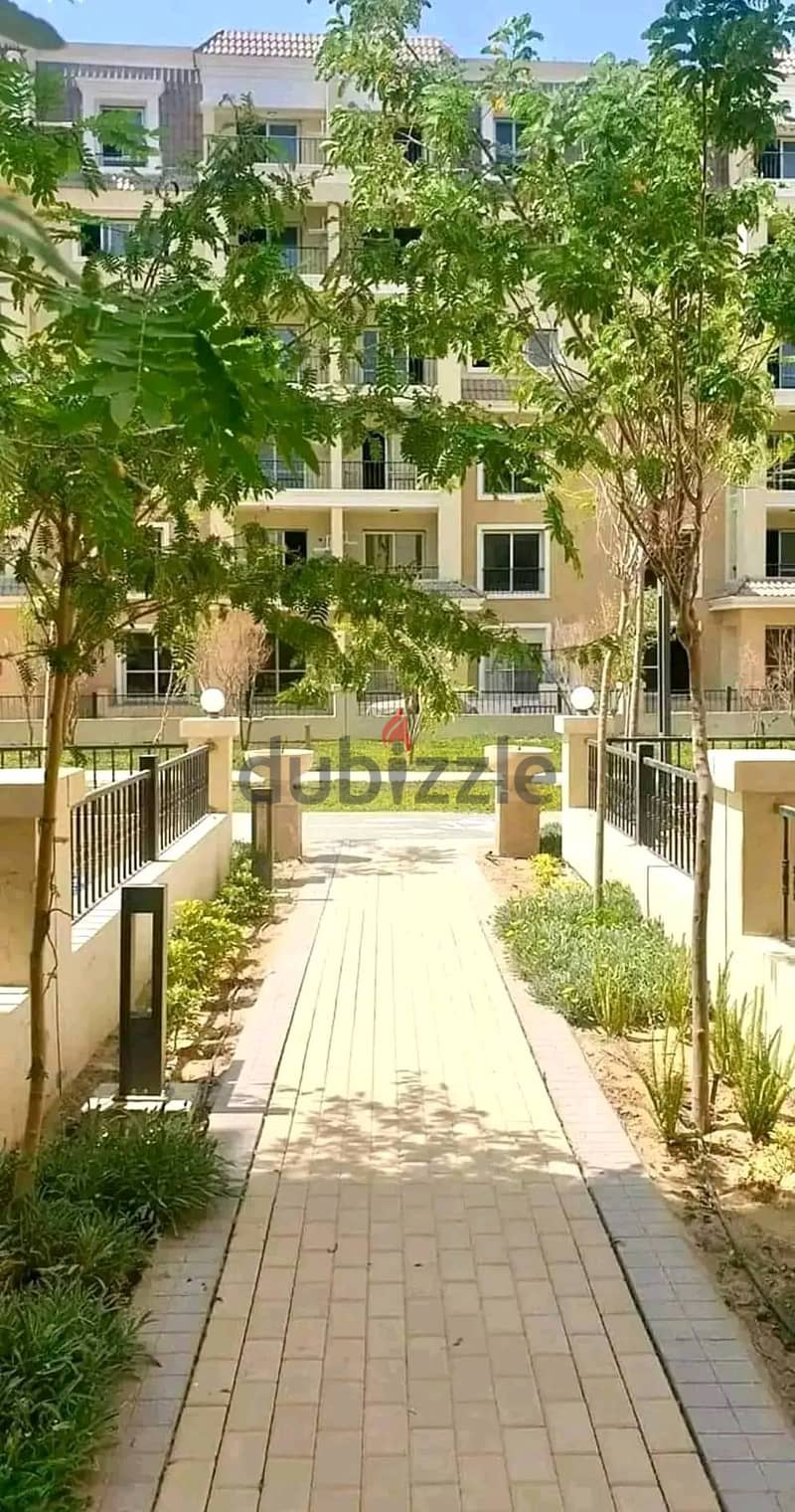 In front of the airport, own a 94 sqm apartment + 26 sqm roof in Sarai Compound in New Cairo. 1
