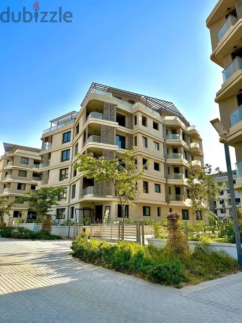 Fully finished garden apartment for sale in 10-year installments from Badya Palm Hills Compound 3