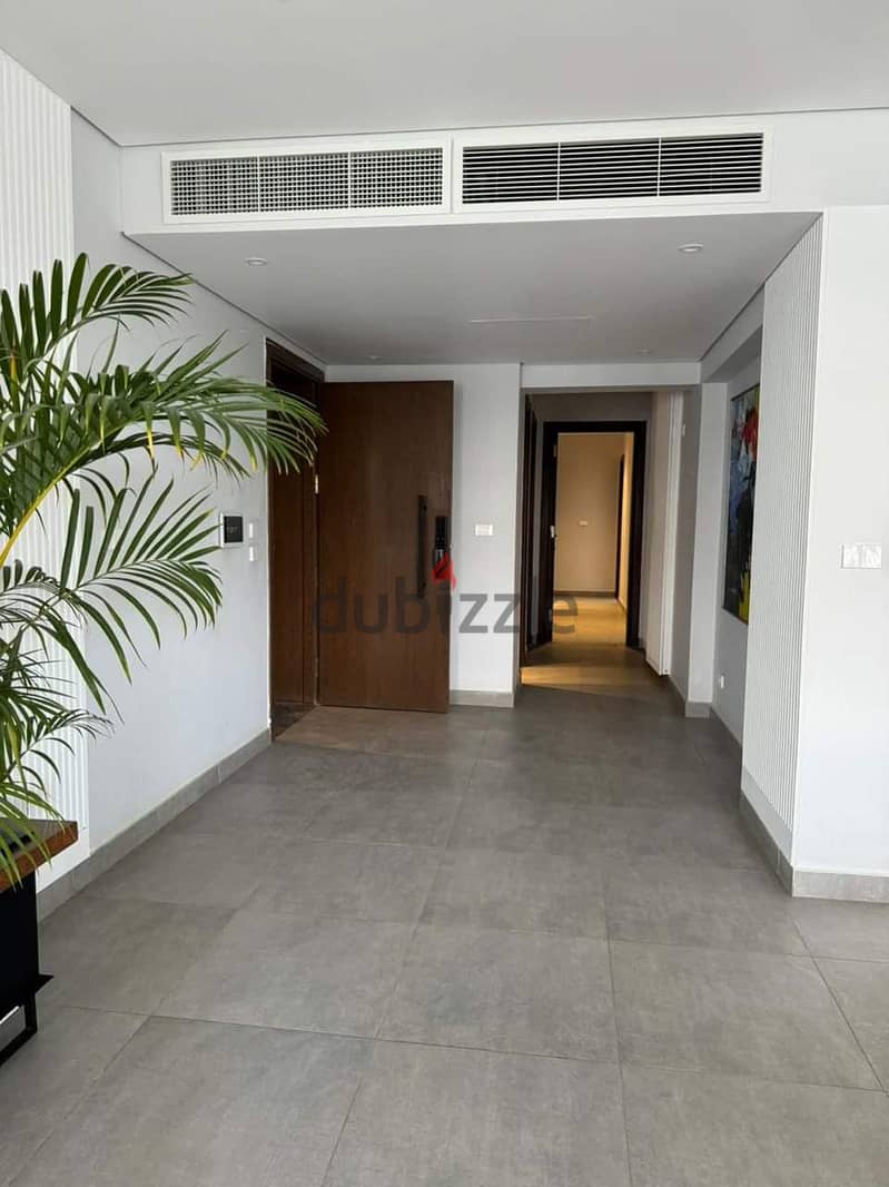 Fully finished garden apartment for sale in 10-year installments from Badya Palm Hills Compound 4