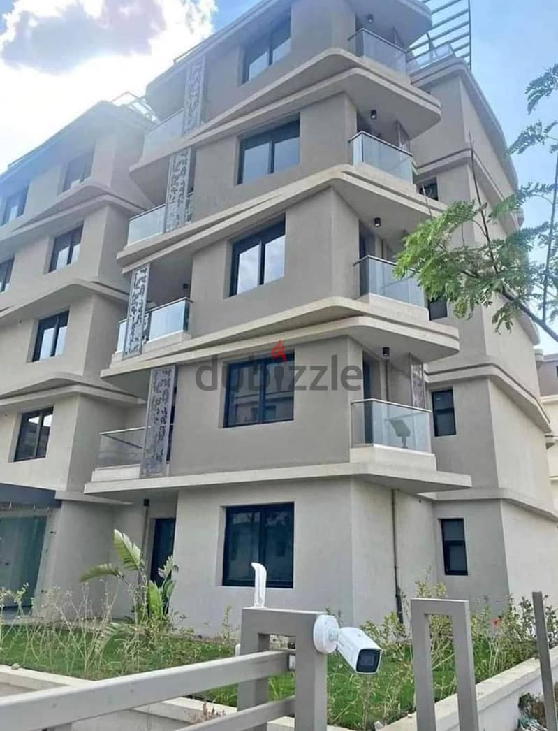 Fully finished garden apartment for sale in 10-year installments from Badya Palm Hills Compound 5