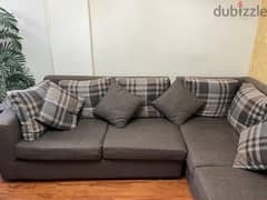 L-Shaped sofa 3.5 x 2.5 meters , used but iin good shake