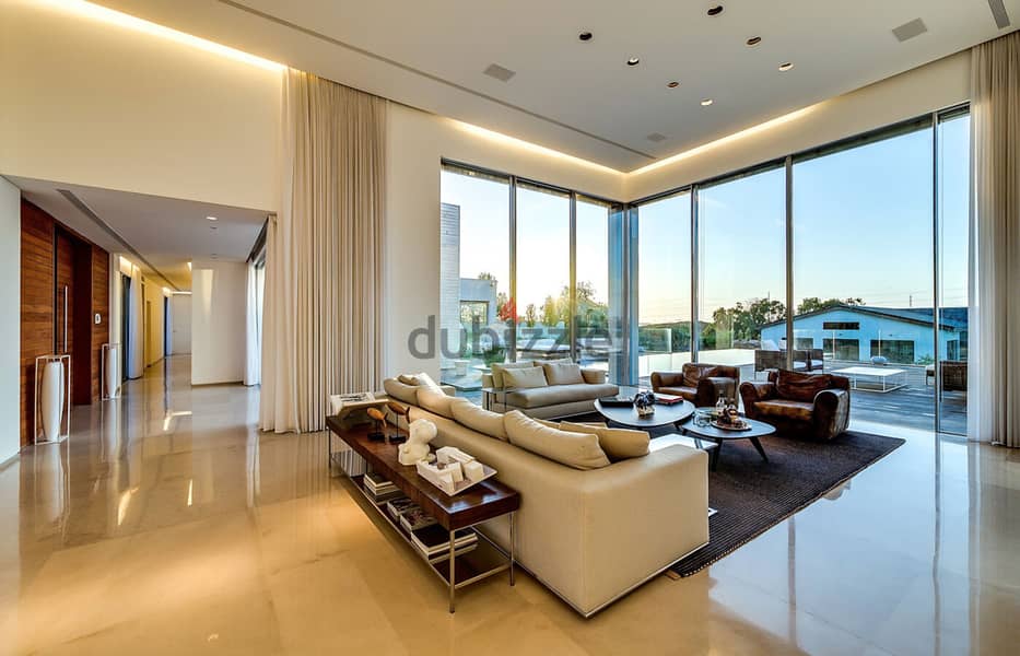 A very elegant villa, ready to move in, in a very elegant compound in the heart of Sheikh Zayed, in front of Sphinx Airport in Sodic The Estates. 1