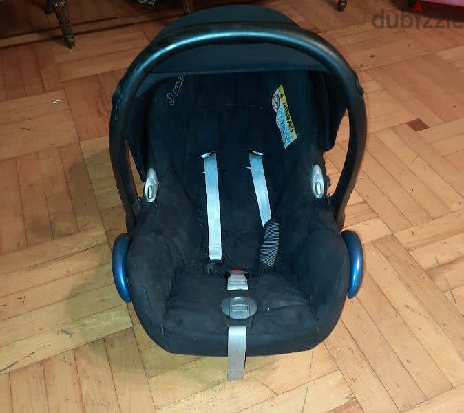 car seat and carrycot 1