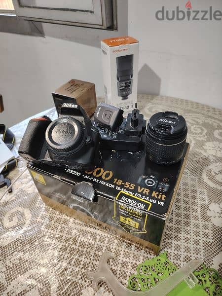 Nikon D3500 كاميرا نيكون بكل حاجتها و لينس وفلاش اضافيين 3