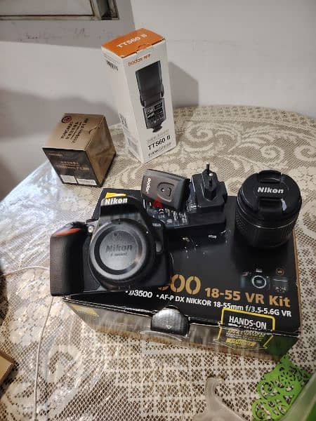 Nikon D3500 كاميرا نيكون بكل حاجتها و لينس وفلاش اضافيين 4