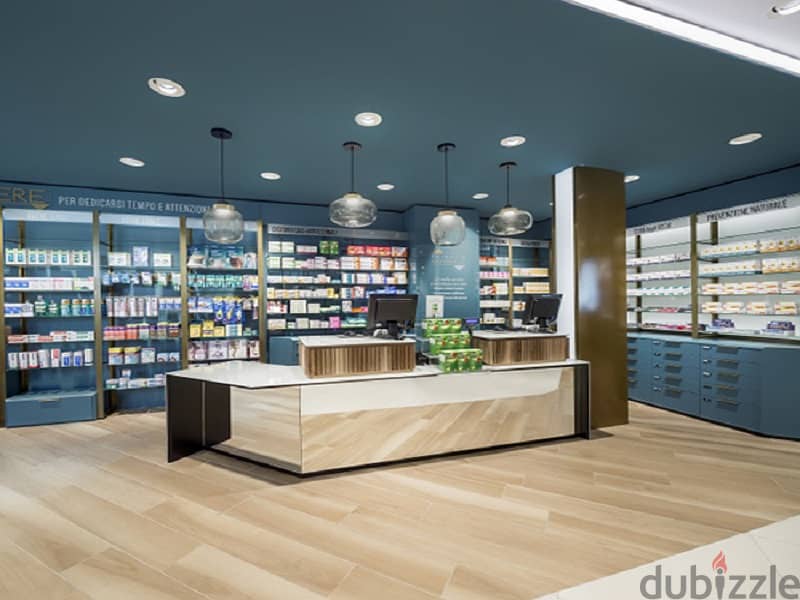 Pharmacy, ground floor, 72 meters, receipt for 24 months, clear frontage on the Dahshur link in Sheikh Zayed, at the lowest price, with a 10% down pay 4
