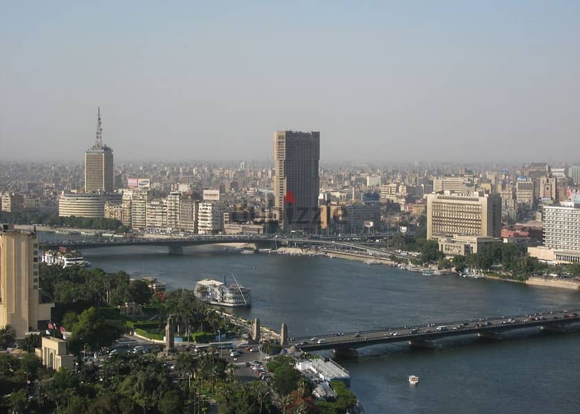 A luxury hotel apartment on the Nile Corniche for sale fully finished with air conditioners managed by Gloria Hotel Services 9