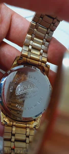 Unisex Golden Original Q&Q watch used in a good condition for sale 0