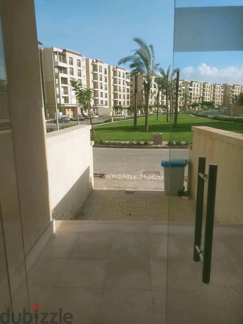 Apartment for sale directly in front of Madinaty, only  down payment and the rest in installments , view on garden 5