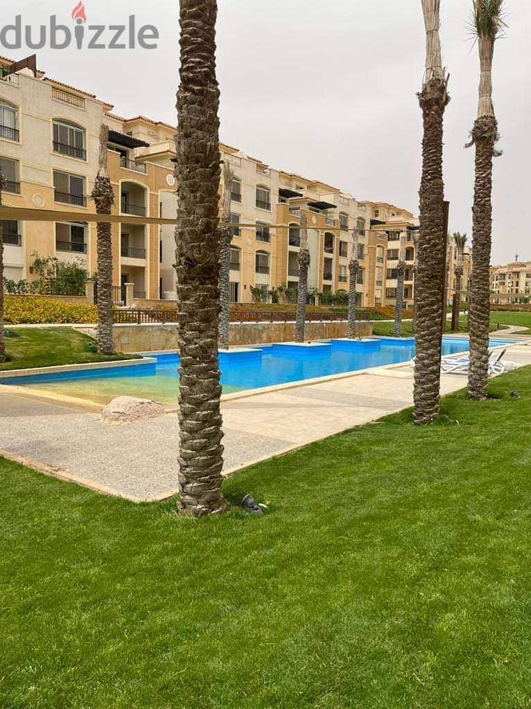 Apartment for sale directly in front of Madinaty, only  down payment and the rest in installments , view on garden 6