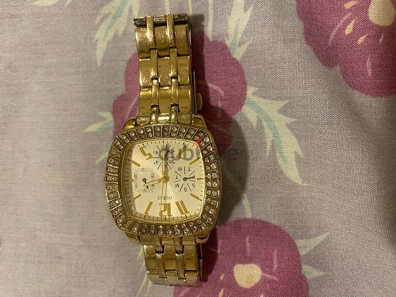 An used Guess watch 0