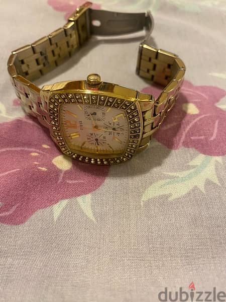 An used Guess watch 1