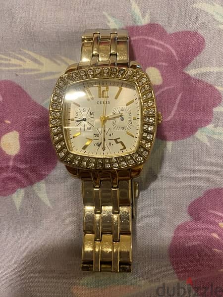 An used Guess watch 3