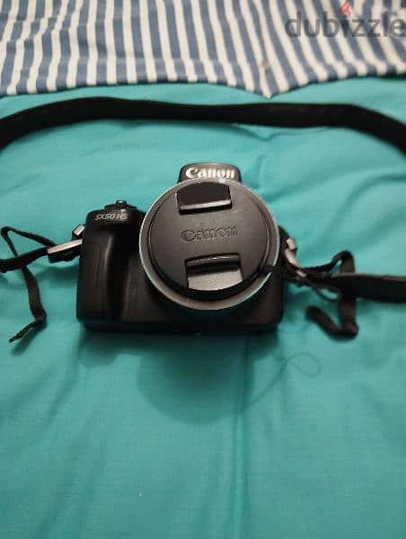 canon camera with battery 8 gb memory card and battery charger 0