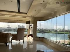 A luxurious hotel studio furnished with upscale furnishings directly on the Nile for sale in installments in the most luxurious hotel tower
