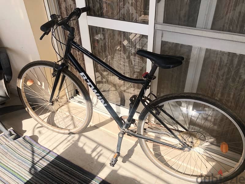 black hybrid bike riverside 100 1