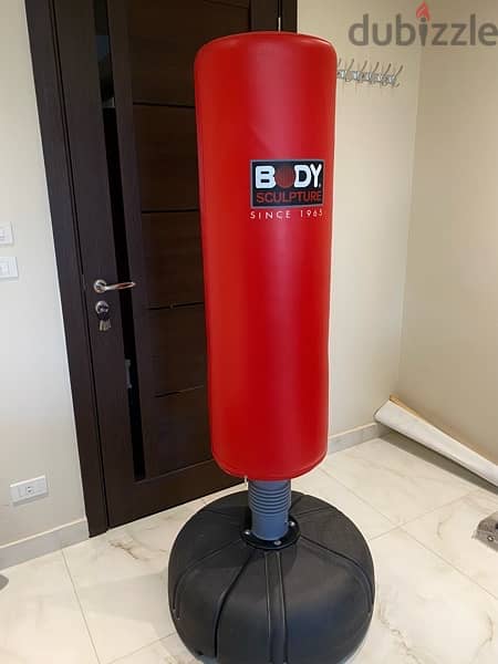 Body sculpture punching bag with base and boxing gloves 1