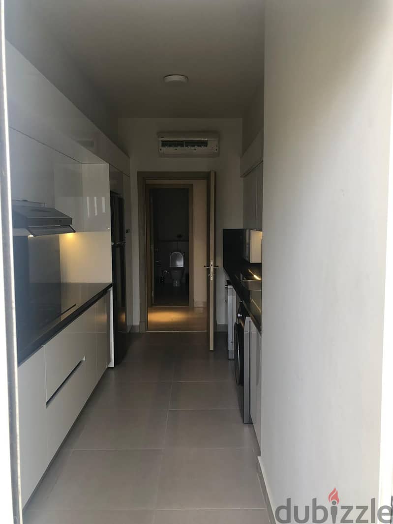 For rent fully finished and furnished with AC`S, kitchen and kitchen applicance apartment in Mivida New Cairo near AUC - ميفيدا التجمع 1
