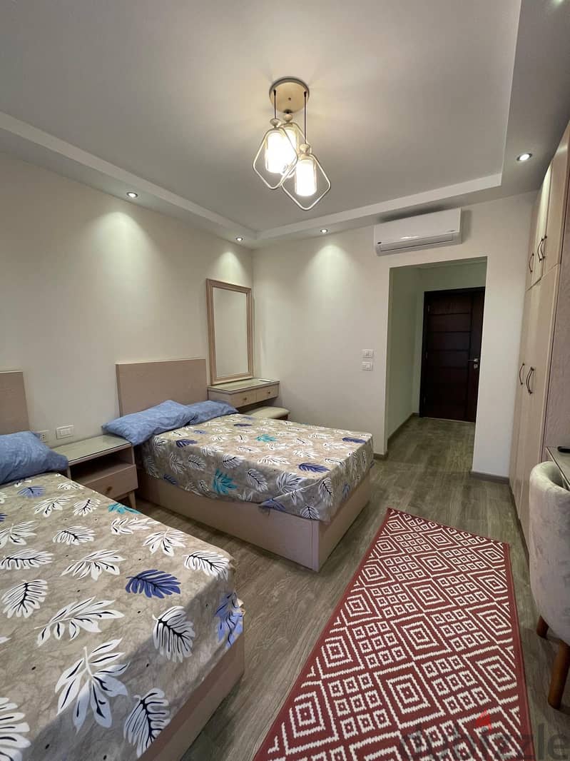 furnished apartment for rent in 90 avenue compound in front of the auc شقة للايجار بكمبوند 90 افينيو  التجمع الخامس - مدد طويلة 18
