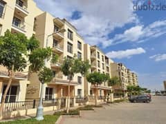 For sale, 130 sqm apartment with private garden, with 742 thousand down payment, in Sarai Compound in New Cairo.