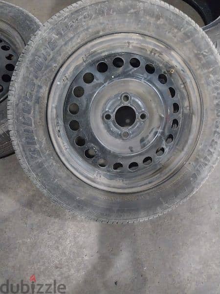 ٤ اطارات كاوتش بريدجيستون مقاس 185/65R15 - مستعمل (البيع بدون الجنوط) 0