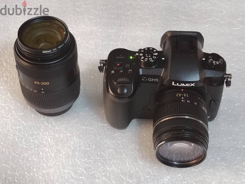 كاميرا أحترافيه:Panasonic LUMIX GH5 20m 4K video Mirrorless body+ Lens 4