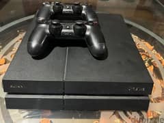 playstation 4 standard + two controllers