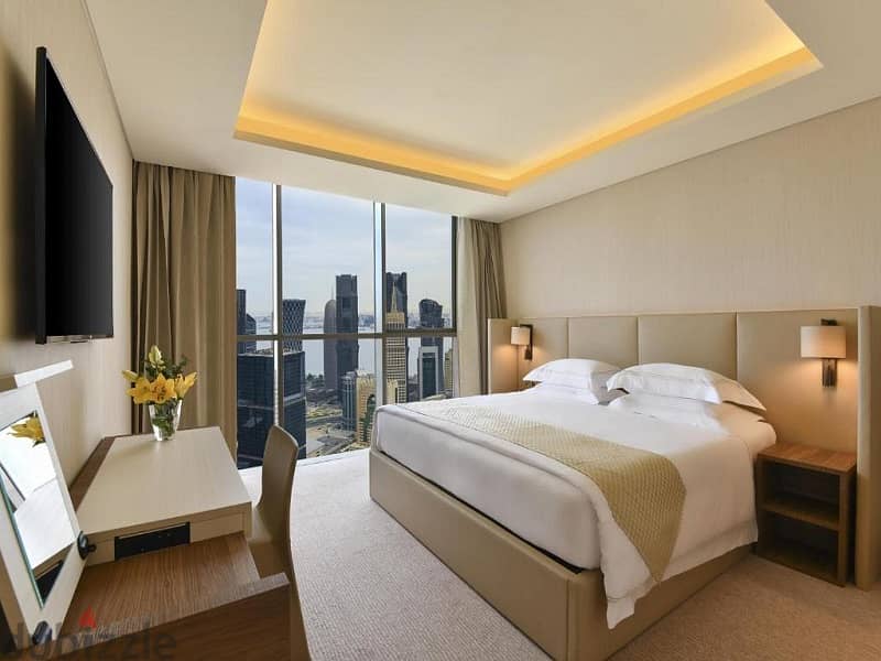 A two-room hotel apartment, fully furnished and furnished, on the Nile Corniche, managed by the Emirati company Gloria, with the longest payment perio 9