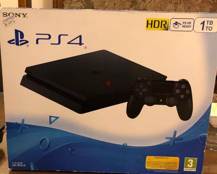 ps4 slim 1tb with original controller and an uncharted 4 CD 3